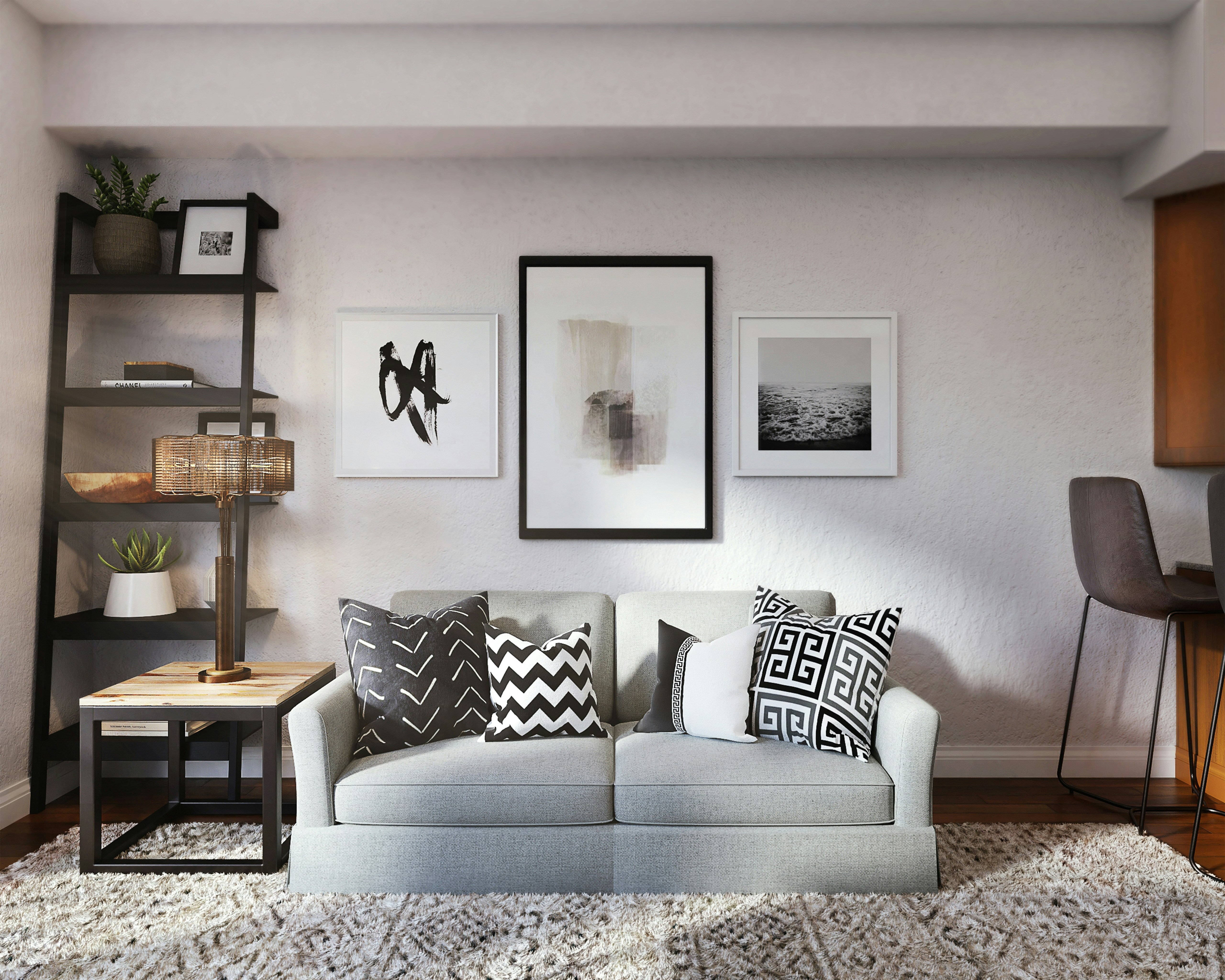 Salón bien decorado con pared galería de pósters abstractos sobre sofá gris — decoración de interiores